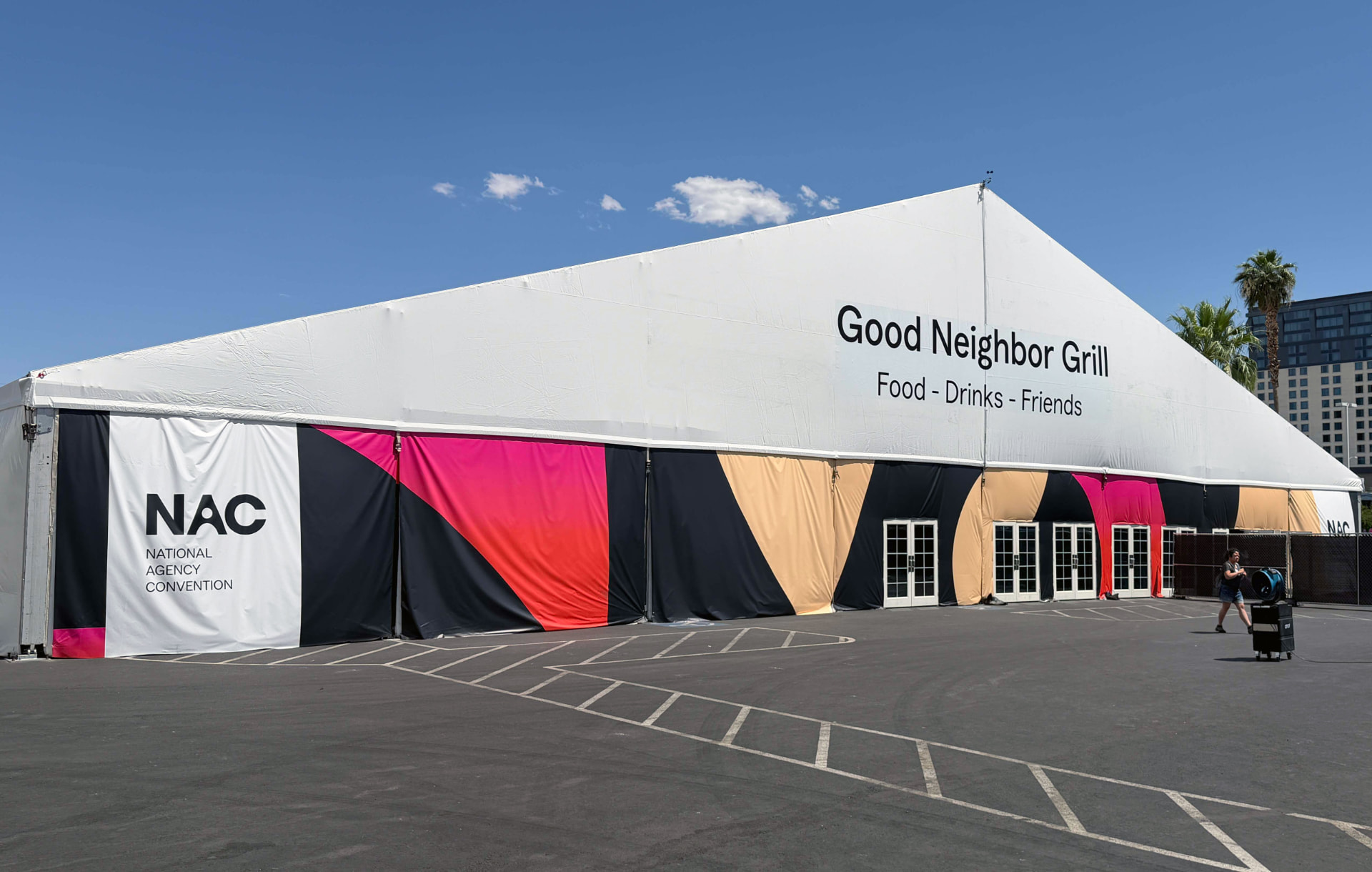 Large event tent wrapped in bold branded graphics